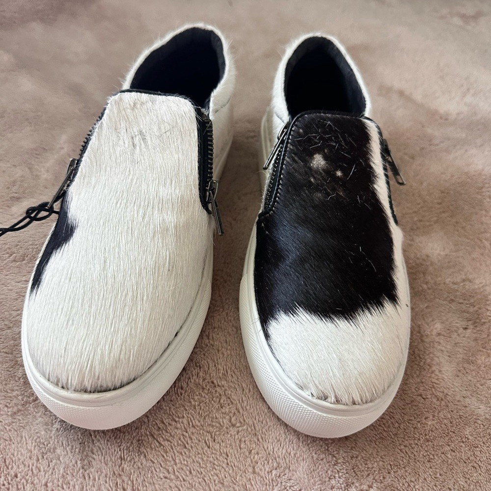Myra Women’s Black and White Slip-On Leather Sneakers